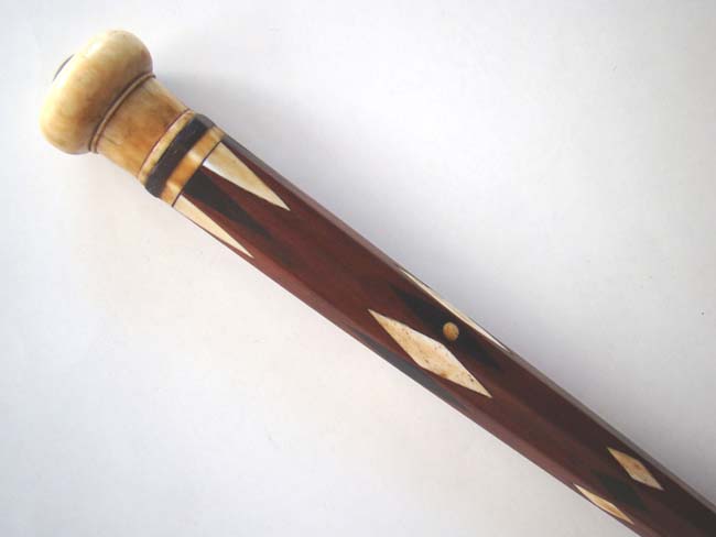 A large and heavy Whale ivory mounted mahogany walking stick with 32 diamond shaped whalebone and ebony inlays circa 1850-1860